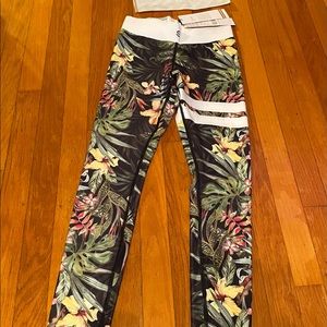 STRONGER Leggings tights size small new with tags never been worn.